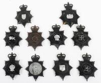 Eight Obsolete Queens Crown Police Night Helmet Plates