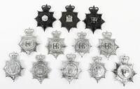 Twelve Obsolete Queens Crown Police Helmet Plates