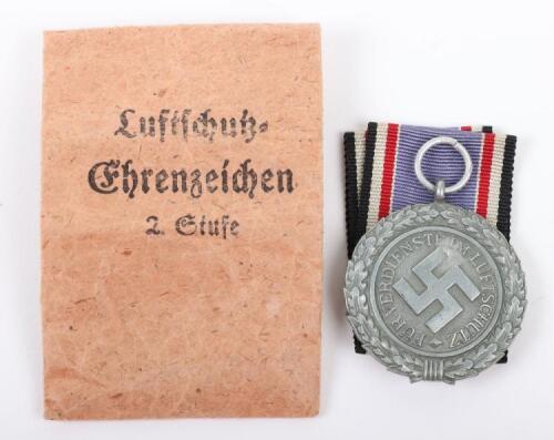 Third Reich Luftschutz Decoration 2nd Class in Original Paper Packet of Issue