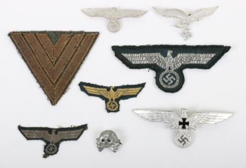 Grouping of WW2 German Cloth and Metal Insignia