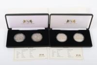 Four cased USA silver Dollars, including 1878, 1921 and 1921 and 1935