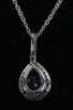 An 18ct white gold diamond and tanzanite pendant necklace - 2