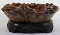 A Chinese carved soapstone bowl