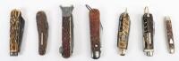A selection of early antler horn folding knives and combination knives