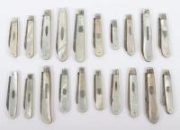 Twenty early 20th century silver and mother of pearl folding fruit knives