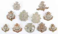 Grouping of East Surrey Regiment Cap Badges