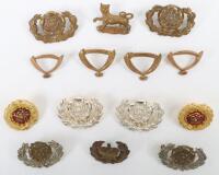 An Assortment of Hampshire Regiment Collar Badges,