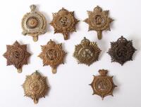 Grouping of Army Service Corps Cap Badges,