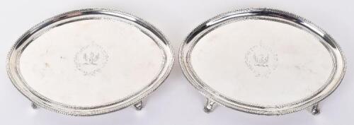 A pair of George III silver salvers, by Thomas Chawner, London 1784