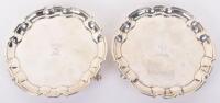 A matched pair of George III silver salvers, by John Tuite, London 1811 and 1813