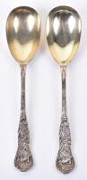 A fine pair of Victorian Bacchanalian pattern parcel gilt salad servers, by Henry John Lias & James Wakely, London 1880