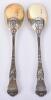 A fine pair of Victorian Bacchanalian pattern parcel gilt salad servers, by Henry John Lias & James Wakely, London 1880 - 5