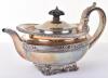 A heavy George III silver tea pot, by Benjamin Smith III, London