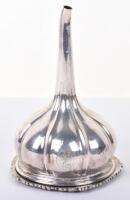 A 19th century French silver wine funnel