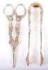 A set of French silver gilt Bacchanalian pattern tongs and scissors