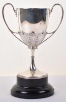 An early 20th century silver trophy cup on stand, by James Dixon & Sons, Sheffield 1911,