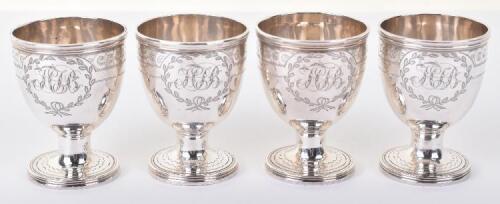 A set of four George III silver egg cups, by Walter Brind, London 1795