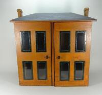 A wooden cupboard style Dolls House, English 19th century,