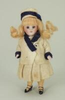 Miniature all-bisque doll in original clothes, German circa 1910,