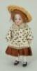 Miniature all-bisque doll in original clothes, German circa 1910,