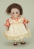 Miniature J.D Kestner all-bisque jointed ‘Googly’ doll in original clothes, German circa 1910,