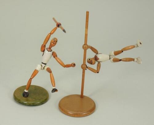 Rare pair of interesting wooden articulate Olympic athletes, German circa 1972,