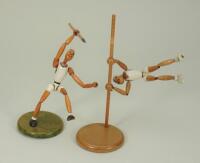 Rare pair of interesting wooden articulate Olympic athletes, German circa 1972,