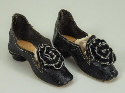 Pair of black leatherette Fashion style doll shoes,