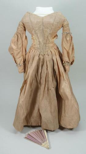 Pink silk gown for large early doll, circa 1850,