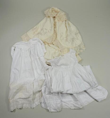 Thirteen long white cotton baby nightgowns, mostly 19th century,