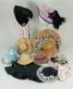 Nine dolls bonnets,