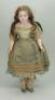 A good all original Montanari poured wax shoulder head doll, English circa 1860,