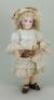 Rare and interesting early bisque head mystery Bebe doll for &lsquo;AU NAIN BLEU&rsquo; of Paris, French circa 1880,