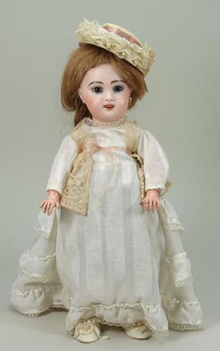 A Jumeau bisque head Bebe doll marked R.R, French 1890s,