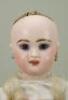 A Jumeau bisque head Bebe doll marked R.R, French 1890s, - 2