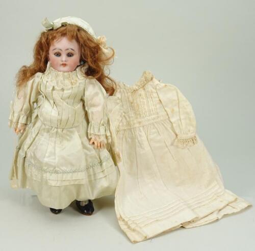 A charming small size Simon & Halbig DEP bisque head Bebe doll, German for French market, circa 1905,