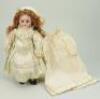 A charming small size Simon & Halbig DEP bisque head Bebe doll, German for French market, circa 1905,