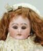A charming small size Simon & Halbig DEP bisque head Bebe doll, German for French market, circa 1905, - 2