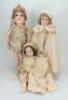 Four bisque head girl dolls, German circa 1915,