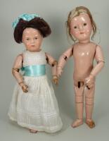 Pair of Schoenhut wooden dolls, American 1920’s,