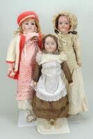 Three bisque shoulder head dolls, English 1915-20,