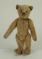 A small German mohair Teddy bear, possibly Bing circa 1909,
