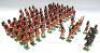 Britains and other repainted Gordon Highlanders marching