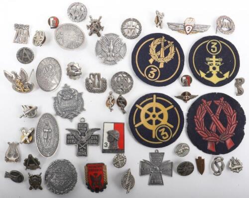 Grouping of Polish Military Badges and Insignia