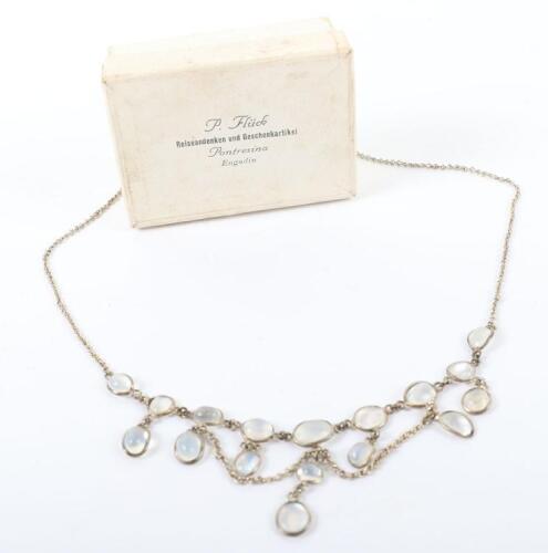 An Art Nouveau silver and moonstone necklace, in the style of Liberty & Co
