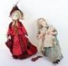 Two character dolls by Rosemary Bradshaw of a Victorian lady in rocking chair with twin babies and a Victorian lady with parasol and stole