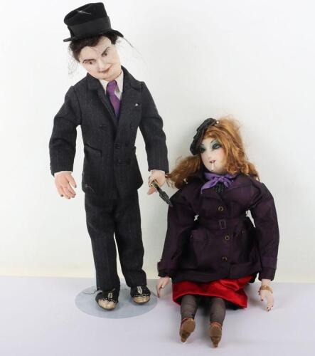 Two character dolls by Rosemary Bradshaw of a 1930Õs style French prostitute doll with cigarette in mouth, with a USA 1930Õs gangster with revolver in hand