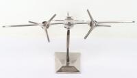 A chromed model of a Mosquito plane on plinth