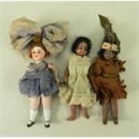 All-bisque miniature mulatto doll, German circa 1910,