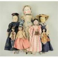 Collection of nine carved wooden peg dolls, German late 19th century,